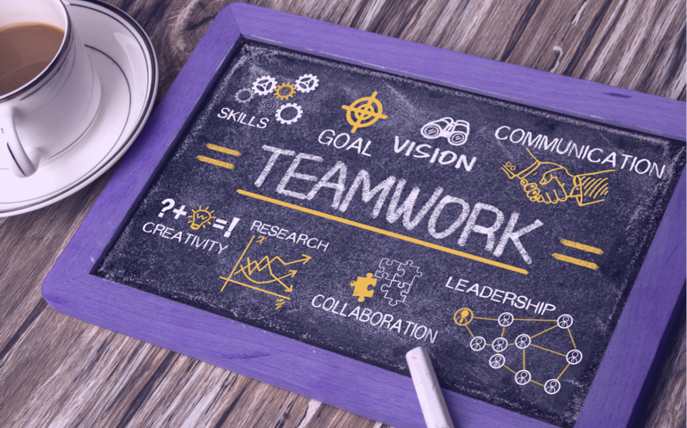A blackboard with teamwork elements.