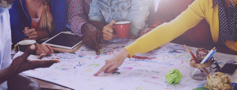 A team of people working on a creative project.